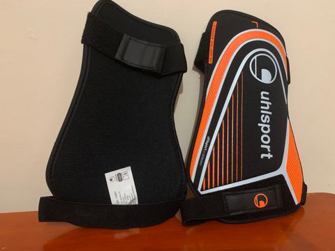 PROTEGE TIBIA NOIR/ORANGE PAILLE